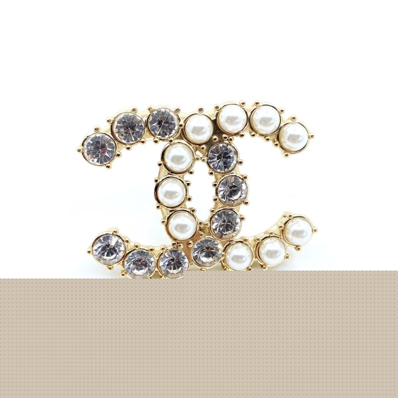 Ch*el brooches